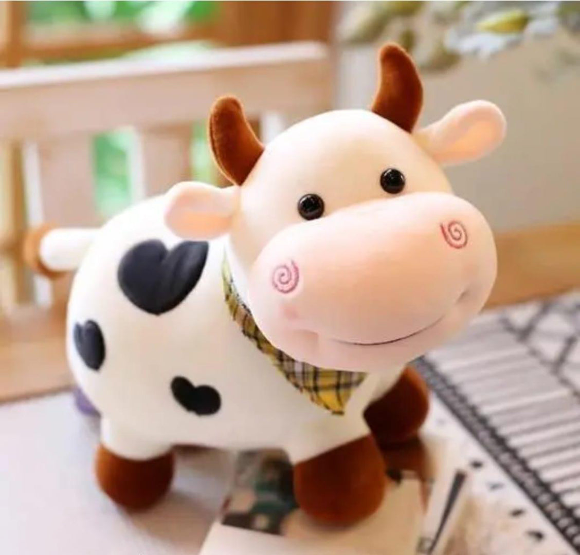 Stuffed Toy Of Baby Cow Cut Face Expression To Put On Table Image 1
